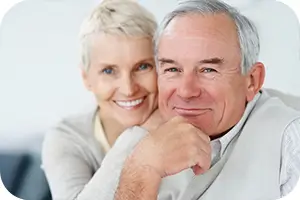 Older couple relaxing in their living room.