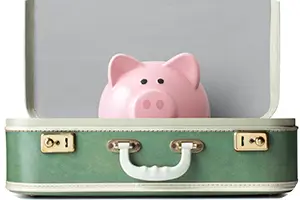 Piggy bank in a suitcase to take to the dentist.